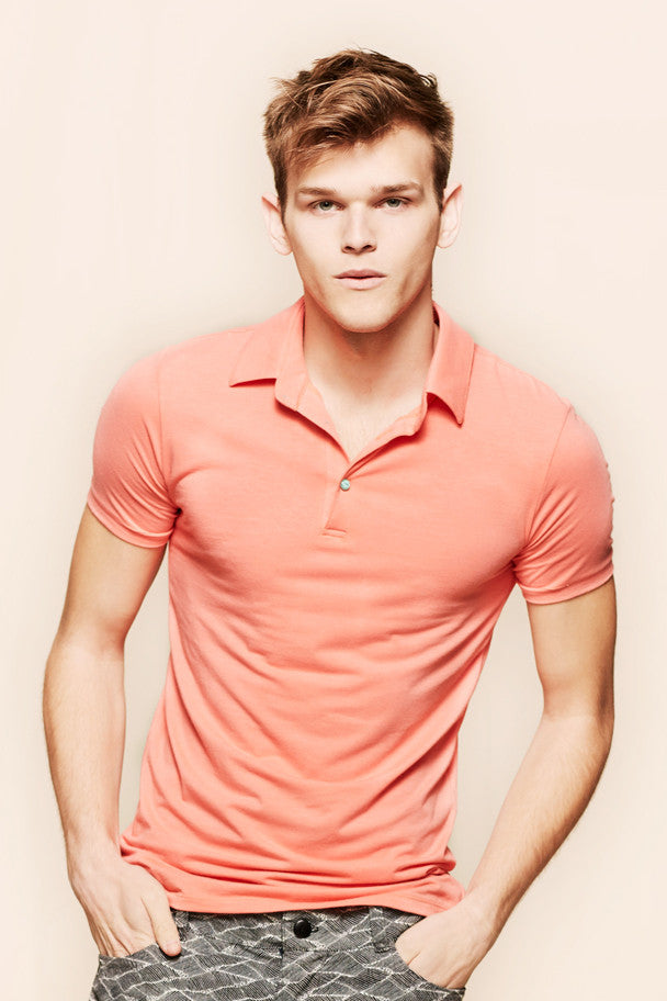 oda - men's coral polo - front view